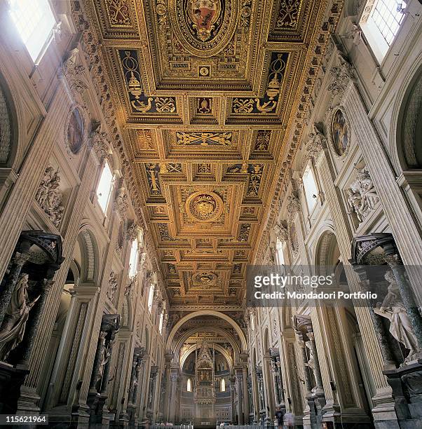 Italy; Lazio; Rome; San Giovanni in Laterano Basilica. Detail. Interior view of nave apse coffered ceiling caisson pilaster strips decoration