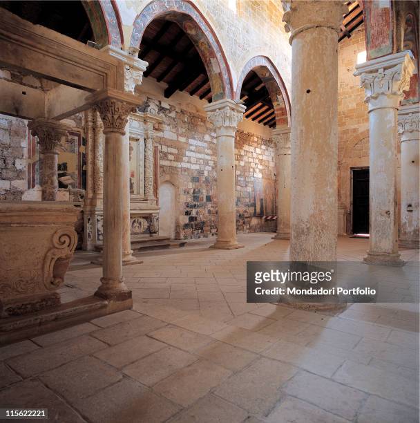 Italy; Puglia; Lecce; Lecce; Santa Maria di Cerrate Church. Detail. Interior Church of Santa Maria di Cerrate Lecce nave columns Gothic capitals...