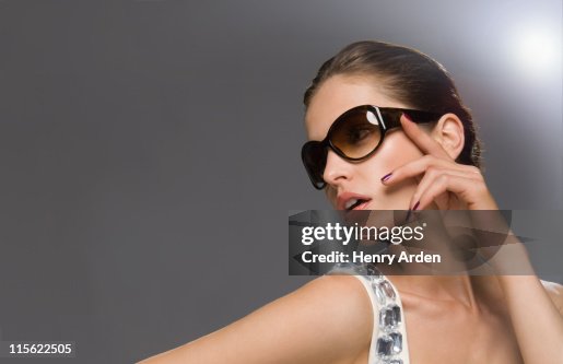 Model Looking Off Camera Fashion Model In Glasses Looking Off Camera High-Res Stock Photo ...