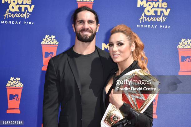 Seth Rollins and Becky Lynch attend the 2019 MTV Movie & TV Awards at Barker Hangar on June 15, 2019 in Santa Monica, California.