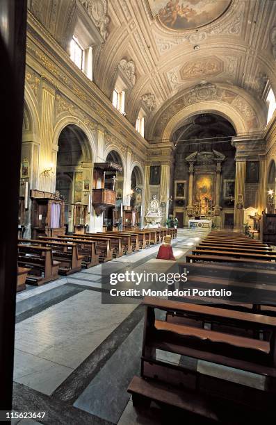 Italy, Lazio, Rome, Santa Maria della Concezione Church. View nave five chapels on each side separated by pilaster strips raised presbytery choir...