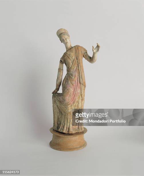 Italy, Puglia, Taranto, National Archaeological Museum. Whole artwork. Female figure dancing chiton imation classical art rhythm chiastic balance...