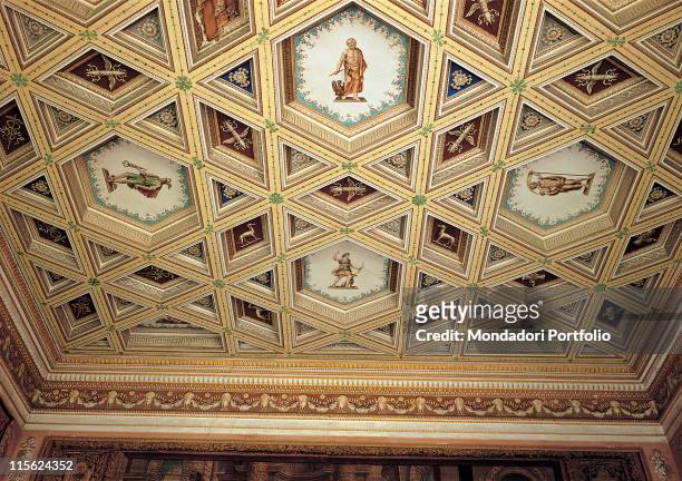 Italy, Lombardy, Mantua, Palazzo Ducale. Detail. Coffered ceiling figures geometric shapes beige brown white green.