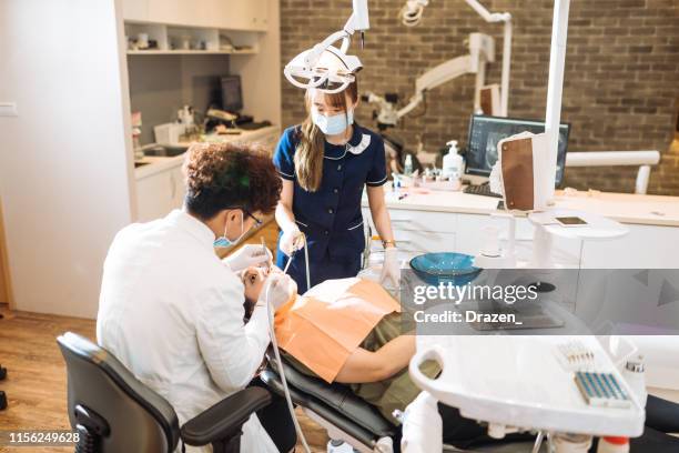 Dental Team Together Photos and Premium High Res Pictures - Getty Images