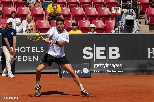 Federico Delbonis of Argentina plays a backhand during his match against Pablo Cuevas of Uruguay during the FTA singles tournament at the 2019...