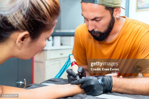 632 Permanent Tattoo Photos and Premium High Res Pictures - Getty Images 632 Permanent Tattoo Photos and Premium High Res Pictures - Getty Images