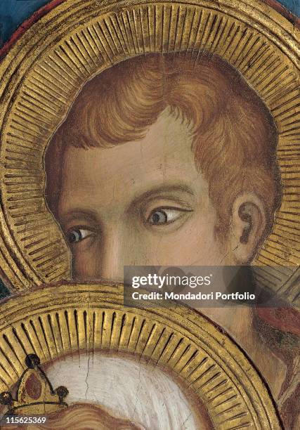 Italy, Tuscany, Siena, Palazzo Pubblico, Sala del Mappamondo. Detail. Face of the Apostle Philip halo; aureole rays gold brown hues; shades light...