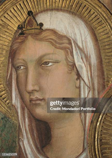 Italy, Tuscany, Siena, Palazzo Pubblico, Sala del Mappamondo. Detail. Face of St Agnes veil crown halo; aureole rays pink gold brown hues; shades...