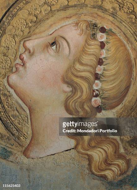 Italy, Tuscany, Siena, Palazzo Pubblico, Sala del Mappamondo. Detail. Face of the angel bearing the cup of lilies hairstyle crown flowers halo;...