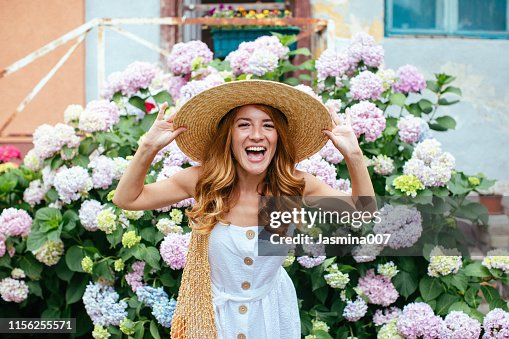 Beautiful girl with Hydrangea flowers Beautiful girl with Hydrangea flowers