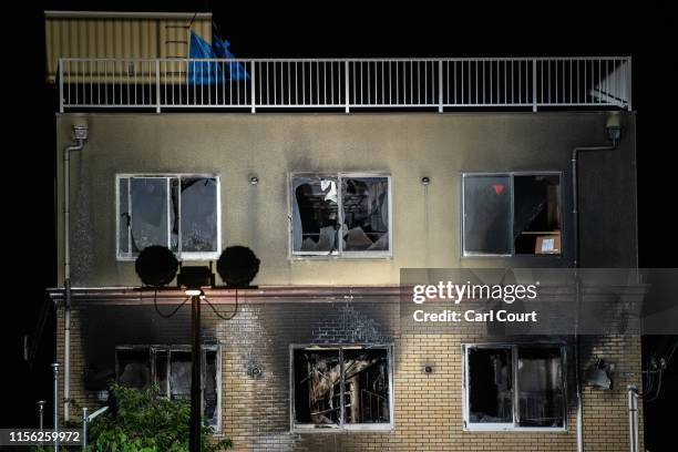 The Kyoto Animation Co studio building is pictured after being set ablaze by an arsonist on July 18, 2019 in Kyoto, Japan. Thirty three people are...