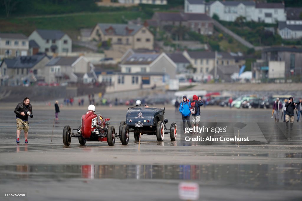 Hit Rod Racing Uk Cars make their return to the pit area during the Vintage Hot Rod ...