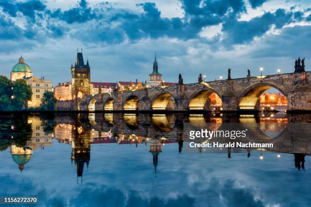 old town with charles bridge, bridge tower and vltava river, prague, bohemia, czech republic - prague stock pictures, royalty-free photos & images