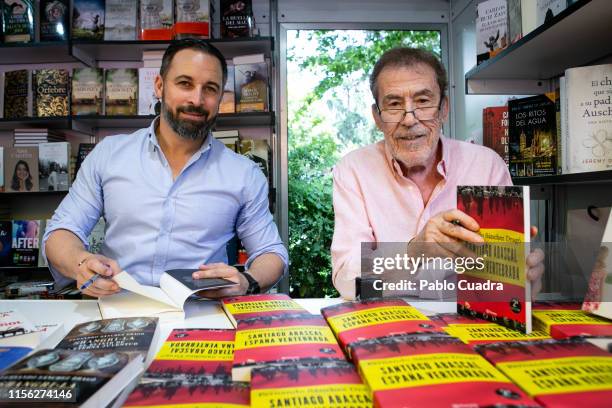Santiago Abascal and Fernando Sanchez Drago attend Book Fair Madrid 2019 at Retiro Park on June 16, 2019 in Madrid, Spain.
