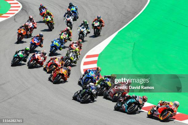 Marc Marquez of Spain and Repsol Honda Team leads the pack during the MotoGP race during the MotoGP Gran Premi Monster Energy de Catalunya at Circuit...