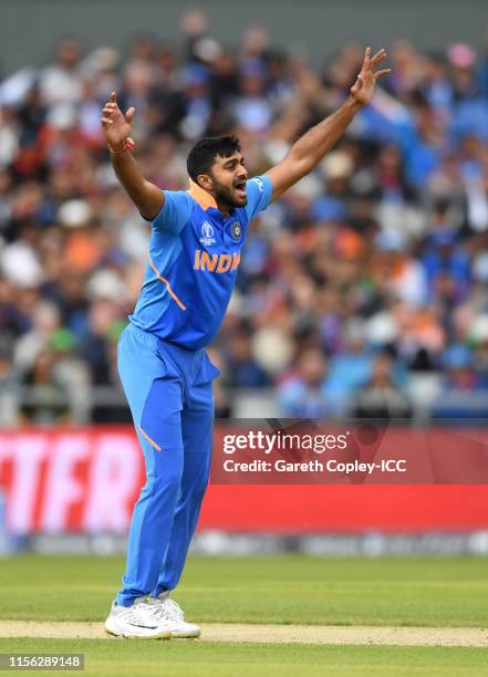 Vijay Shankar of India celebrates dismissing Imam-ul-Haq of Pakistan during the Group Stage match of the ICC Cricket World Cup 2019 between Pakistan...