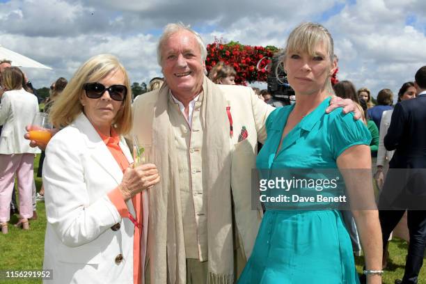 Adi Cook, John Rendall and Debbie Leng attend The Cartier Queen's Cup Polo Final 2019 on June 16, 2019 in Windsor, England.