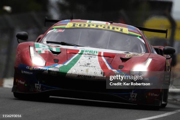 The AF Corse Ferrari 488 GTE EVO of Alessandro Pier Guidi, James Calado and Daniel Serra drives during the Le Mans 24 Hour Race at the Circuit de la...