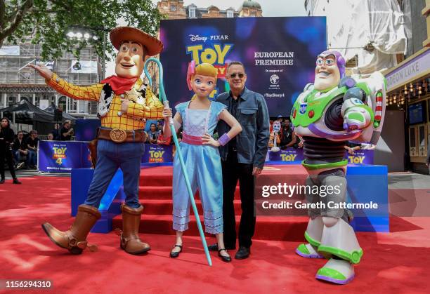Woody, Bo Peep, Tom Hanks and Buzz Lightyear attend the European premiere of Disney and Pixar's "Toy Story 4" at the Odeon Luxe Leicester Square on...