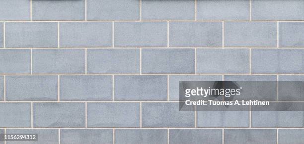 modern light bluish gray slab wall background - light blue tiled floor stock pictures, royalty-free photos & images