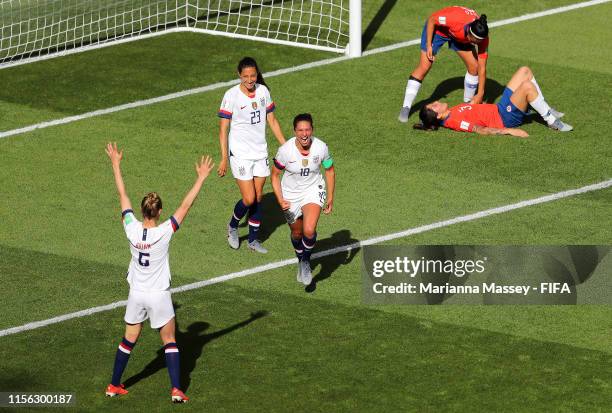 Carli Lloyd of the USA celebrates with teammate Morgan Brian after scoring her team's third goal during the 2019 FIFA Women's World Cup France group...