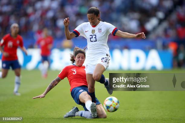 Carla Guerrero of Chile tackles Christen Press of the USA during the 2019 FIFA Women's World Cup France group F match between USA and Chile at Parc...
