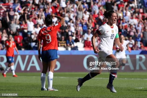Carli Lloyd of the USA celebrates after scoring her team's third goal during the 2019 FIFA Women's World Cup France group F match between USA and...