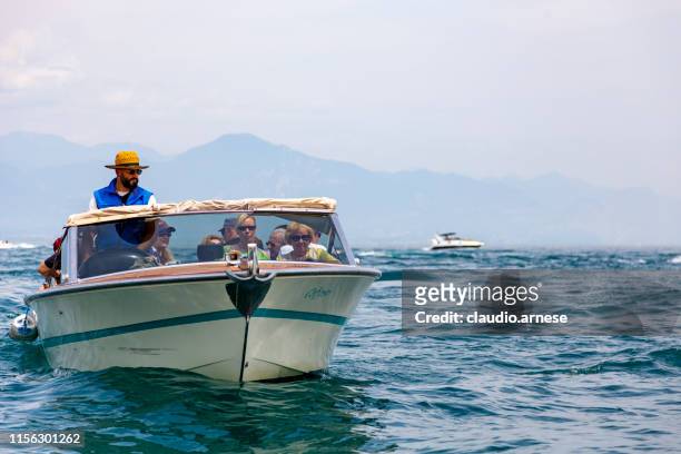 sirmione boat tour - sirmione stock pictures, royalty-free photos & images