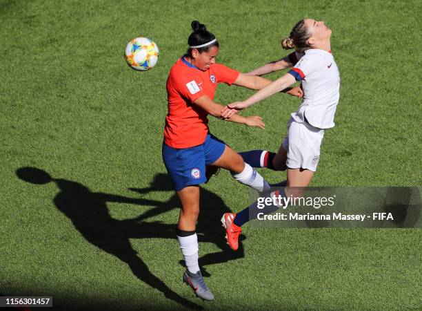 Morgan Brian of the United States competes for a header with Claudia Soto of Chile during the 2019 FIFA Women's World Cup France group F match...