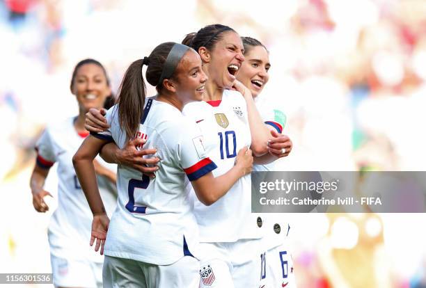 Carli Lloyd of the USA celebrates with teammates after scoring her team's third goal during the 2019 FIFA Women's World Cup France group F match...