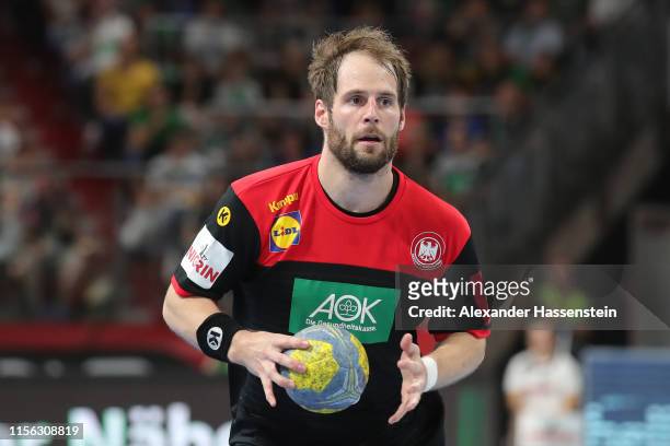 Nico Buedel of Germany fights for the ball during the EHF EURO 2020 Qualifier match between Germany and Kosovo at Arena Nuernberg on June 16, 2019 in...