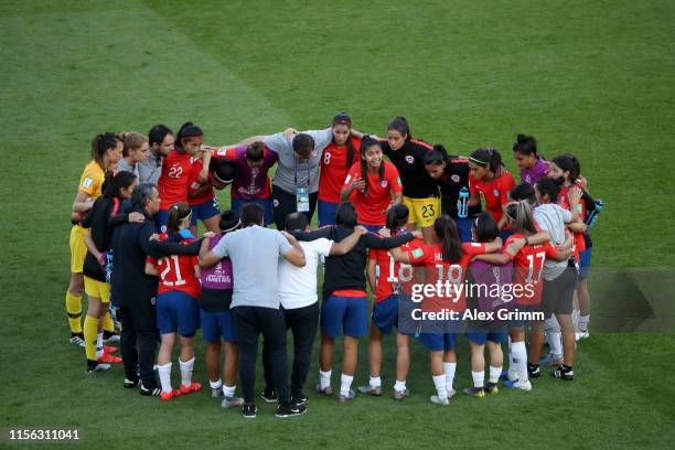 Francisca Lara of Chile speaks to her teammates as they form a team huddle after the 2019 FIFA Women's World Cup France group F match between USA and...