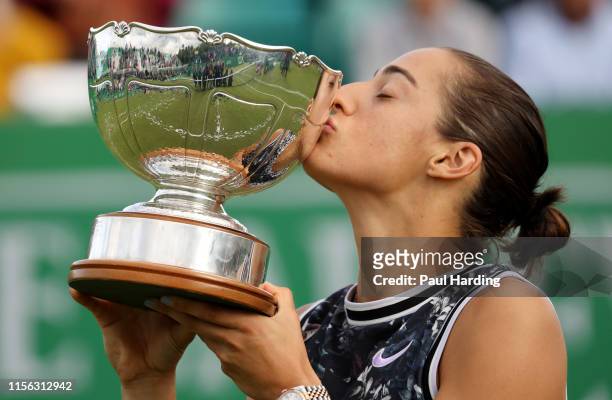 Caroline Garcia of France celebrates with the trophy after winning the Womens Singles Final during day 7 of the Nature Valley Open at Nottingham...