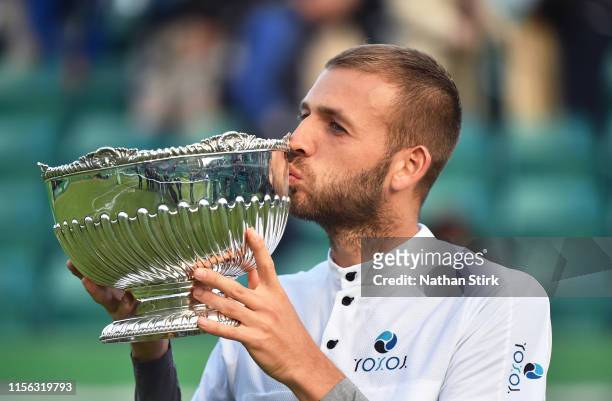 Daniel Evans of Great Britain celebrates as he wins the final match against Evgeny Donskoy of Russia during day seven of the Nature Valley Open at...