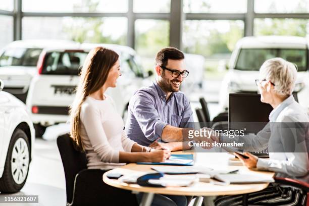 congratulations, we have a deal about buying a car! - used car salesman stock pictures, royalty-free photos & images