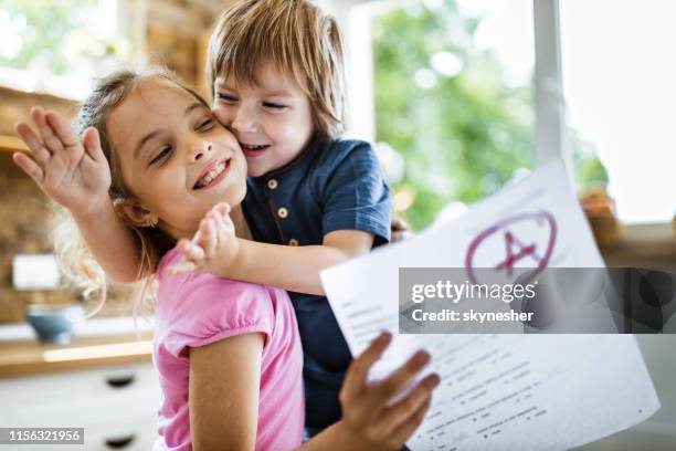 good job sis, an a on your test! - child report card stock pictures, royalty-free photos & images