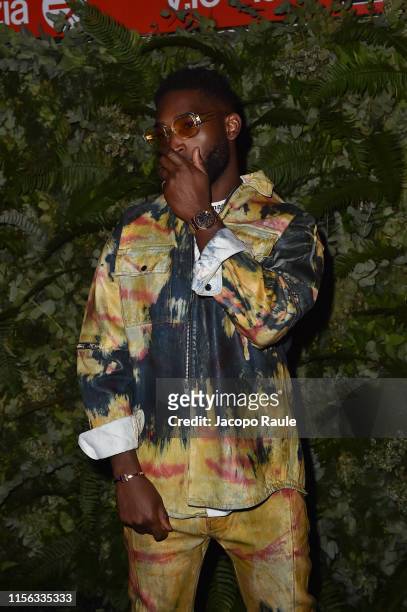 Tinie Tempah attends the Palm Angels fashion show during the Milan Men's Fashion Week Spring/Summer 2020 on June 16, 2019 in Milan, Italy.