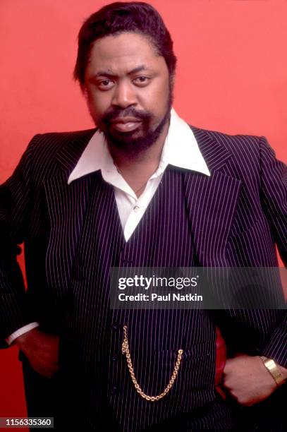 Portrait of American Blues musician Son Seals as he poses with his guitar in a photo studio, Chicago, Illinois, February 12, 1980. The photo was part...