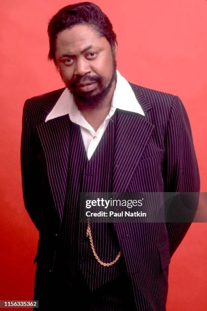 Portrait of American Blues musician Son Seals as he poses with his guitar in a photo studio, Chicago, Illinois, February 12, 1980. The photo was part...