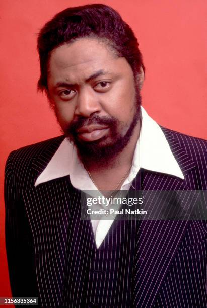 Portrait of American Blues musician Son Seals as he poses with his guitar in a photo studio, Chicago, Illinois, February 12, 1980. The photo was part...