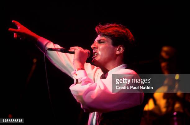 English New Wave singer Tony Hadley, of the group Spandau Ballet, performs onstage at the Shubert Theatre, Chicago, Illinois, December 1, 1983....