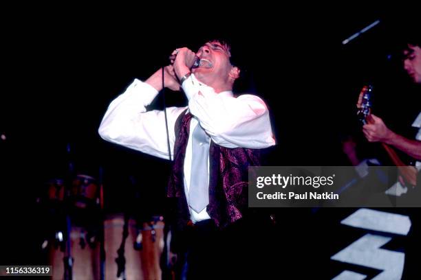 English New Wave singer Tony Hadley, of the group Spandau Ballet, performs onstage at the Shubert Theatre, Chicago, Illinois, December 1, 1983....