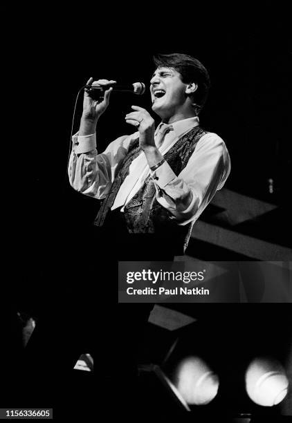 English New Wave singer Tony Hadley, of the group Spandau Ballet, performs onstage at the Shubert Theatre, Chicago, Illinois, December 1, 1983.