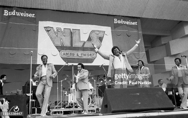 American R&B vocal group the Spinners perform onstage at the Petrillo Bandshell, Chicago, Illinois, July 4, 1984.