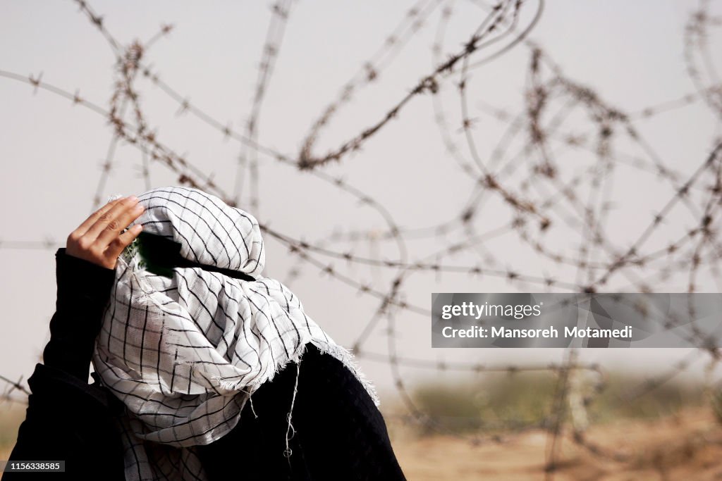 Muslim woman is crying