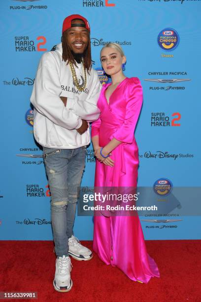 Fetty Wap and Meg Donnelly attend 2019 Radio Disney Music Awards at CBS Studios - Radford on June 16, 2019 in Studio City, California.