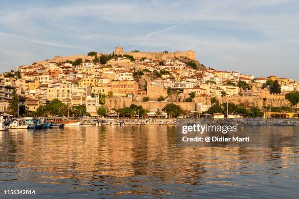 sunset over kavala in greece - kavalla stock-fotos und bilder