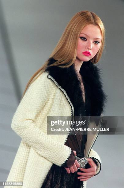 US-Japanese model Devon Aoki presents a white coat with fur lapels News  Photo - Getty Images