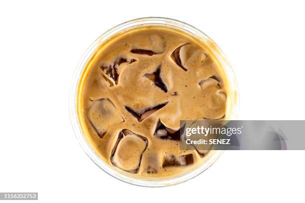 directly above shot of iced coffee over white background - milk pour white background bildbanksfoton och bilder