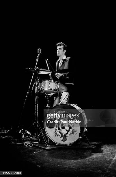 American Rockabilly musician Slim Jim Phantom , of the group Stray Cats, plays drums as he performs onstage at the Park West, Chicago, Illinois,...